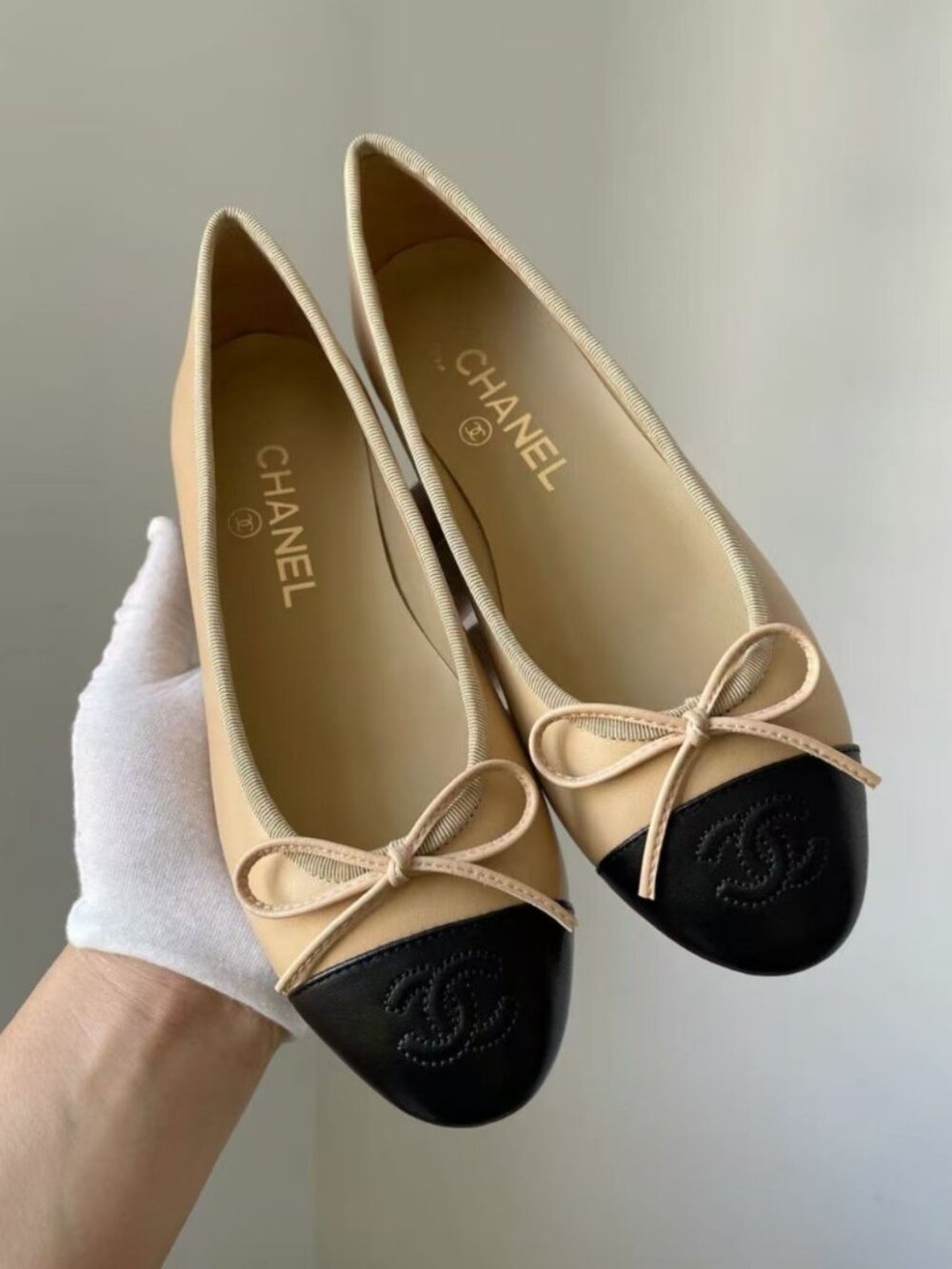 CHANEL Beige & Black CC Ballet Flats